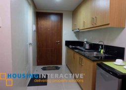 fully furnished 1-bedroom unit with balcony for sale in shell residences