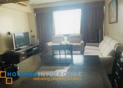 fully furnished 2-bedroom unit with parking for rent in bonifacio ridge