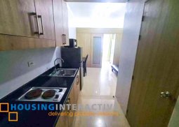 fully furnished 1-br unit with balcony for rent in shore residences