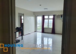 bare 1-bedroom unit with balcony for rent in two serendra
