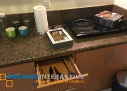 fully furnished 1-bedroom unit with balcony for rent in trion towers