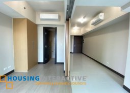 bare 1-bedroom unit with parking for sale in uptown parksuites