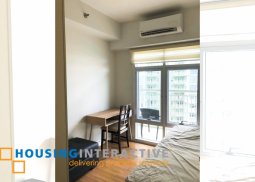 a delightful and palatial 2br condominium at two serendra