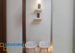 fully furnished 1-bedroom unit with balcony for rent in air residences