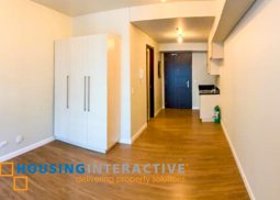 semi-furnished studio type condo unit in kroma tower