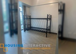 bare 2-bedroom unit with balcony for rent in parkside villas