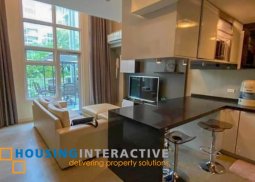 fully furnished 1-bedroom loft unit with parking & patio for rent in two serendra