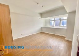 bare 2-bedroom unit with balcony & parking for sale in verve residences