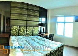 fully furnished 2-bedroom unit with parking for sale in two serendra