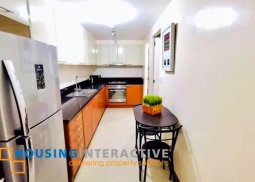 fully furnished 2-bedroom unit with balcony for sale in the venice luxury residences