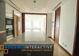 bare 3-bedroom unit with parking for rent in two roxas triangle