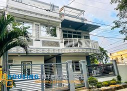 grand 3-storey, 5-bedroom house with roof deck for sale in los baÑos