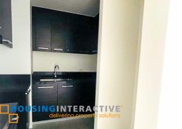 bare 1-bedroom unit with balcony & parking for sale in proscenium residences