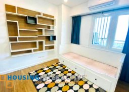 fully furnished 2-bedroom unit with balcony & parking for rent in two serendra