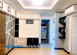 semi furnished 2-bedroom unit with parking for sale in amaryllis