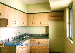 bare 2-bedroom unit with balcony & parking for sale in the amaryllis