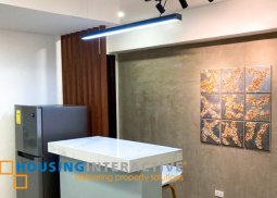 fully furnished 2-bedroom unit with parking & balconies for sale in bsa mansion