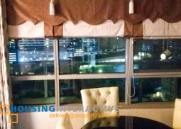 fully furnished 2-bedroom unit with parking & balcony for rent in the residences at greenbelt
