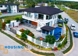 grand 2-storey, 5-bedroom house with pool & balcony for sale in porto laiya