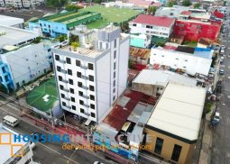 brand new 7-storey, 56-unit building with roof deck for sale in pasong tamo