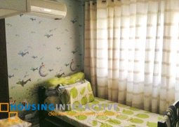 fully furnished 3-bedroom corner unit with balcony & parking for sale in mckinley hill garden villas