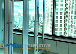 bare 2-bedroom unit with parking for rent in one rockwell