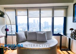 fully furnished 2-bedroom unit with parking & balcony for rent in one rockwell