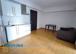 bare 2-bedroom unit with balcony for rent in acqua private residences