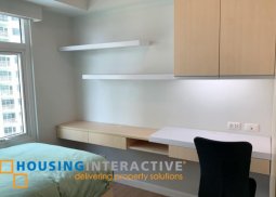 fully furnished 2-bedroom unit with parking for rent in two serendra