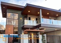 grand 2-storey, 4-bedroom house with balcony for sale in bf resort village