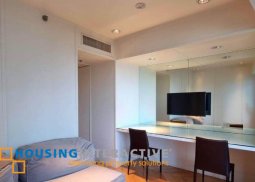 fully furnished 2-bedroom unit with parking for rent in amorsolo square