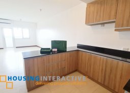 bare 2-bedroom unit with parking & balcony for sale in royalton