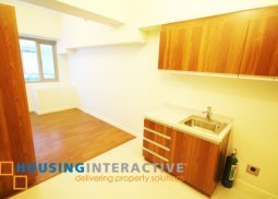 unfurnished studio type condo unit for rent at the eton tower makati