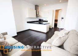 semi furnished 1br condo unit for rent at the trump tower makati