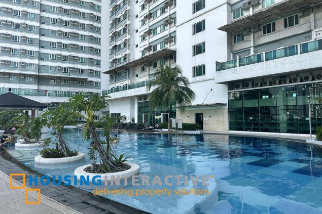 a 2br unit in garden towers makati
