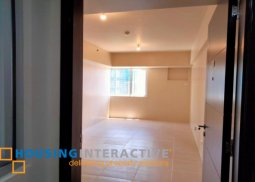 unfurnished studio unit in avida towers turf bgc for sale