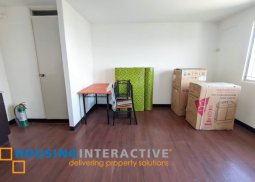 unfurnished studio unit in arezzo place for sale