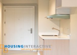 unfurnished studio unit in quezon city for sale