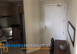 a 2br unit for sale in the grove by rockwell