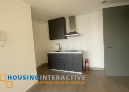 a studio type unit for lease in century spire