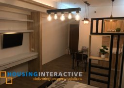 low rise unit in perla mansion with great interior