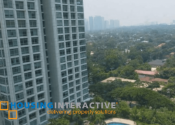 a 4br unit for sale in two roxas triangle
