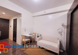 1br unit with balcony for lease in air residences, makati city