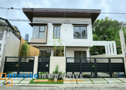 an exquisite 2-storey 5br modern house with jacuzzi for sale at bf homes