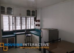 for sale: townhouse style 2-bedroom unit with parking in quezon city