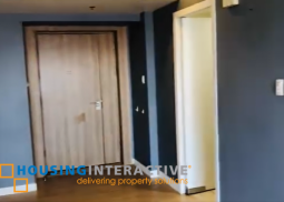 a semi-furnished 2br corner unit for sale in one shangri-la place