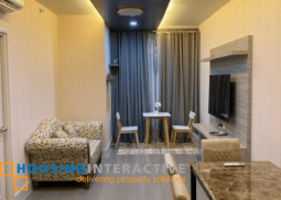a 1br fully furnished unit with balcony for lease in proscenium at rockwell