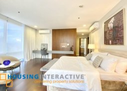 a fancy 4br unit for sale in the suites by ayala land premier
