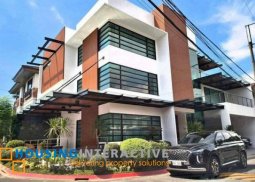 a 3-storey modern house and lot for sale in mahogany place, taguig