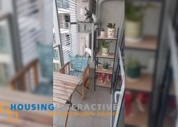 a penthouse with 2 balconies